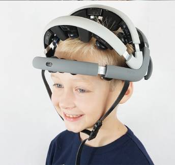 Happy child wearing Zeto Wireless Dry EEG Headset Device